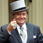 Barry Humphries with CBE